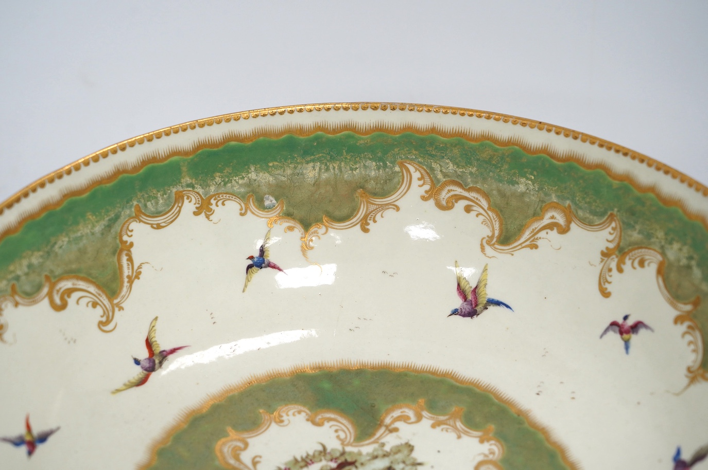 A large Worcester 'Fantastic Birds' bowl, c.1780, 28cm diameter. Condition - good, would benefit from a clean